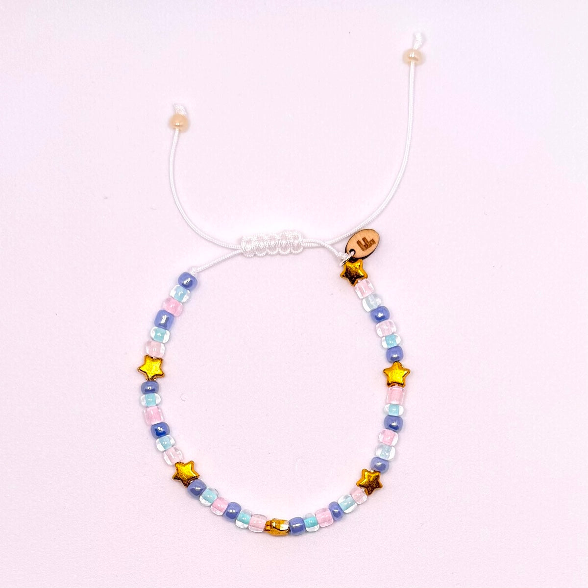 Armband - pastelkraaltjes en sterren
