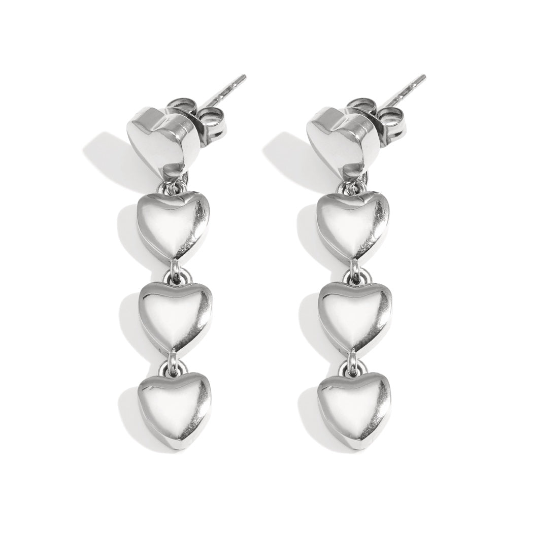 Zilverkleurige hartjes oorbellen