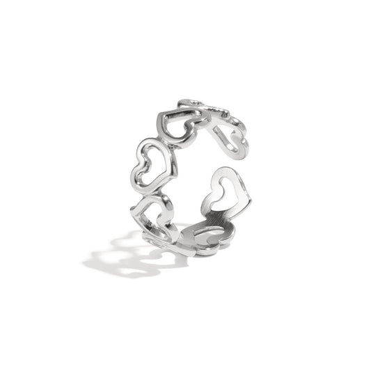 Stainless steel ring - verbonden holle hartjes