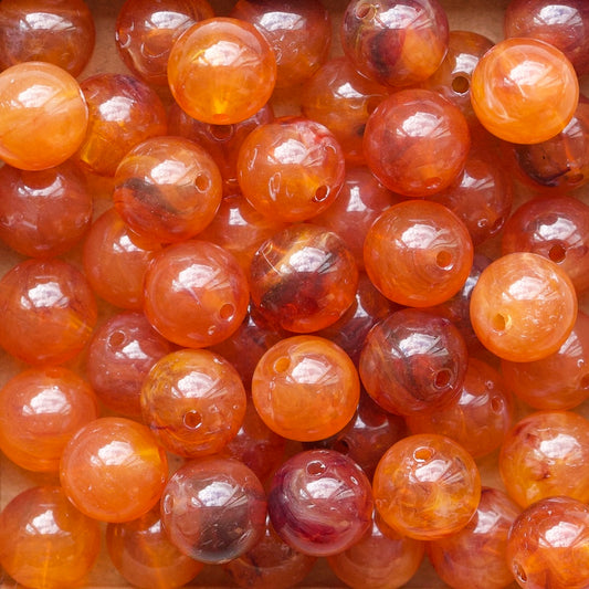 Oranje/bruine acryl kralen rond