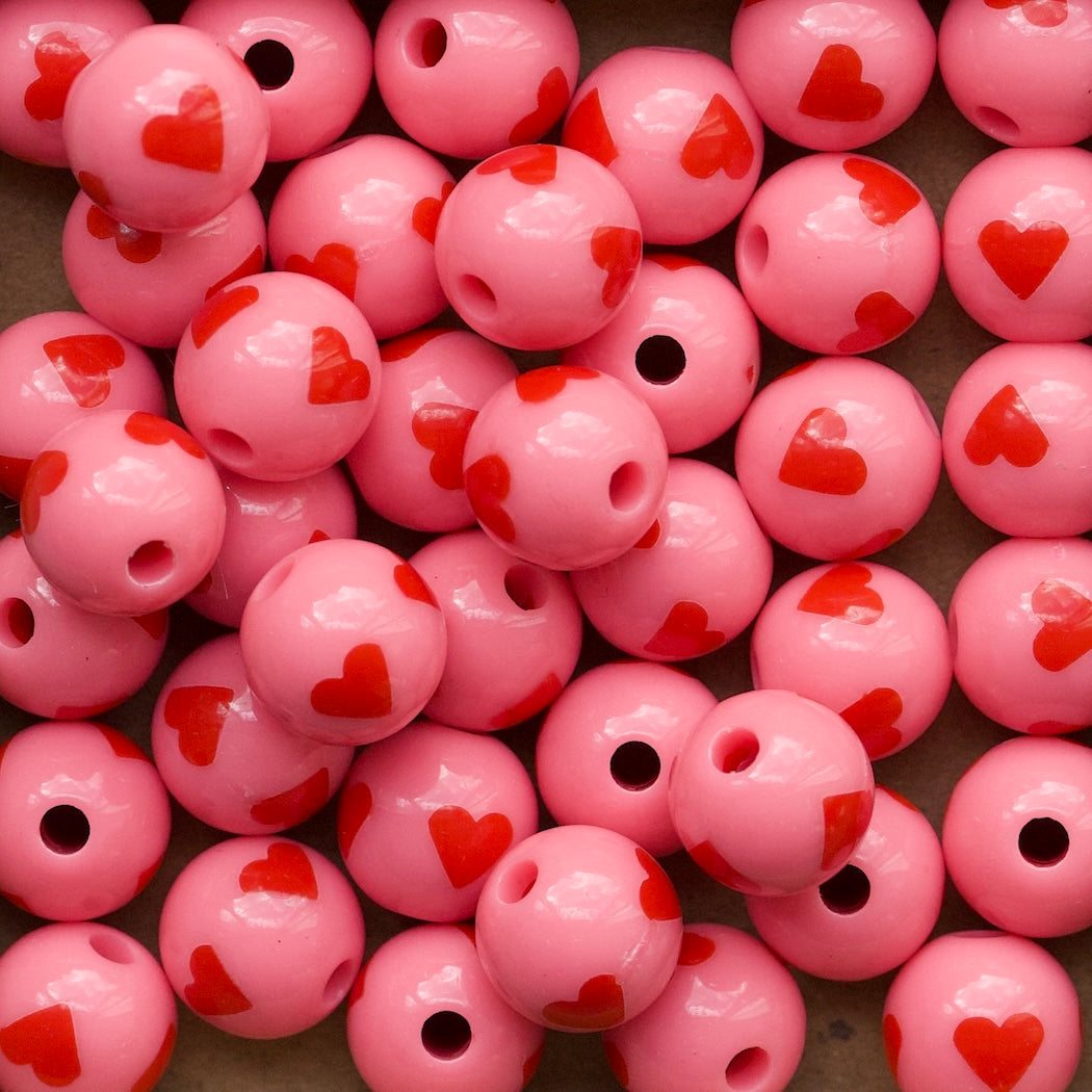 Roze met rood hartje ronde acryl kralen