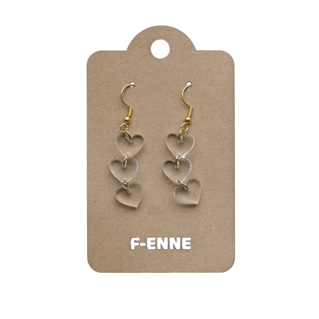 Triple hartjes oorbellen - transparant acryl