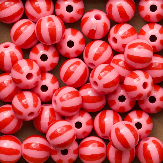 Roze/rood gestreepte ronde acryl kralen