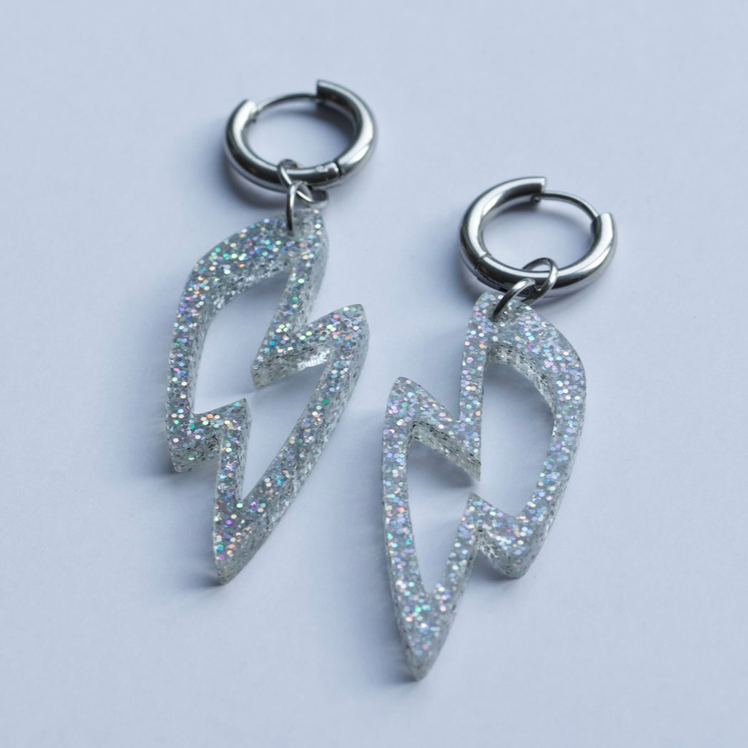 Oorbellen - Bliksem creolen - Glitter acryl