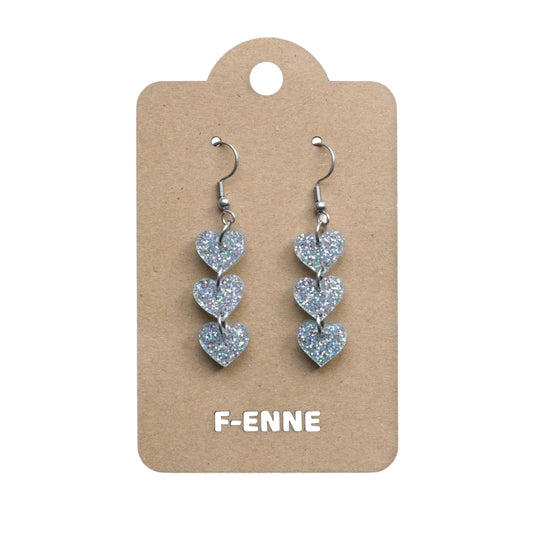 Triple hartjes oorbellen - glitter acryl - zilverkleurig