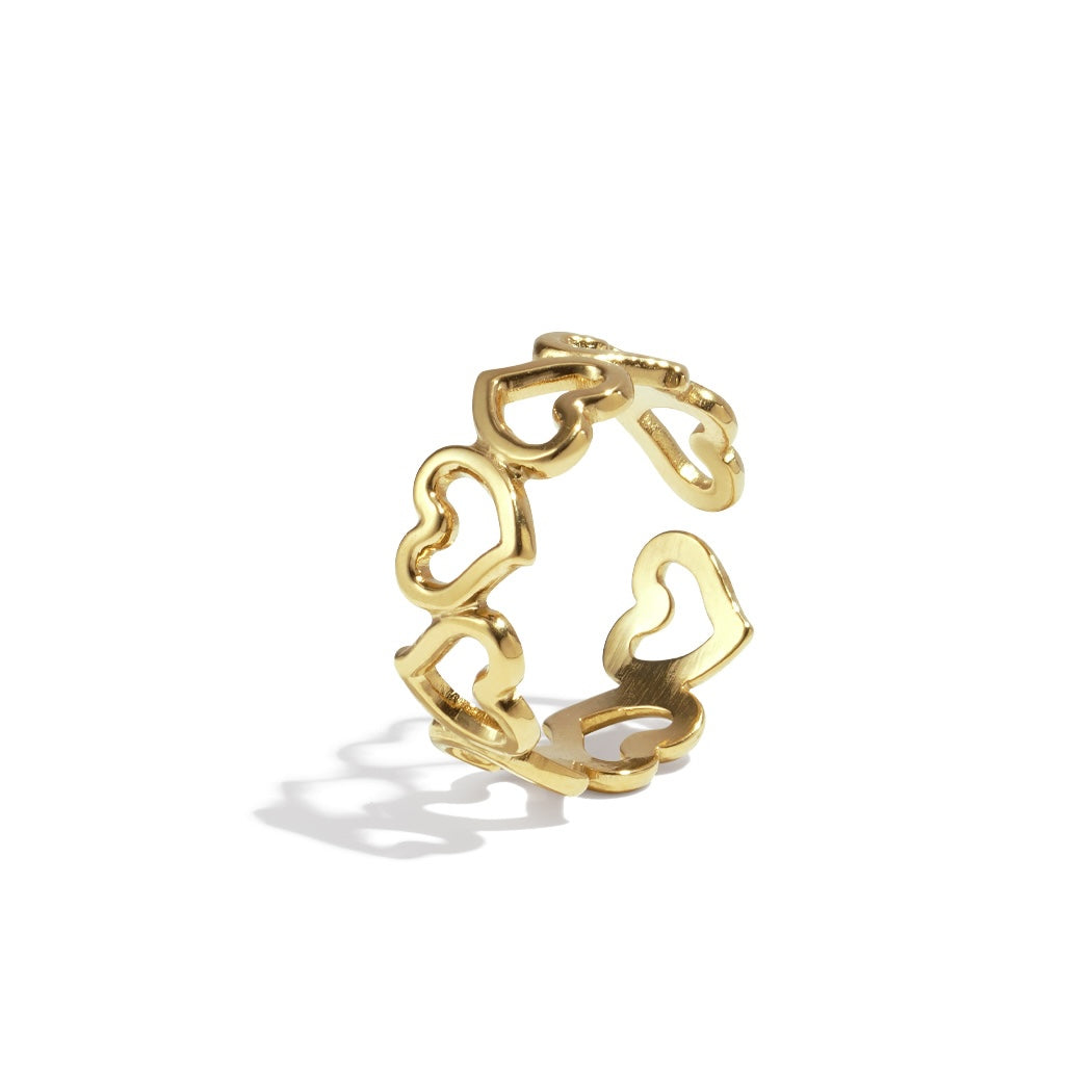 Stainless steel ring - verbonden holle hartjes