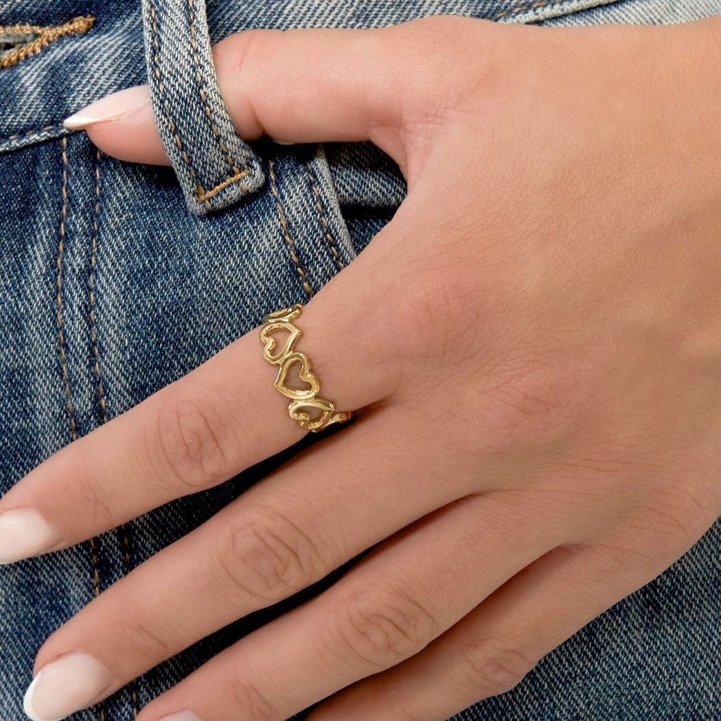 Stainless steel ring - verbonden holle hartjes